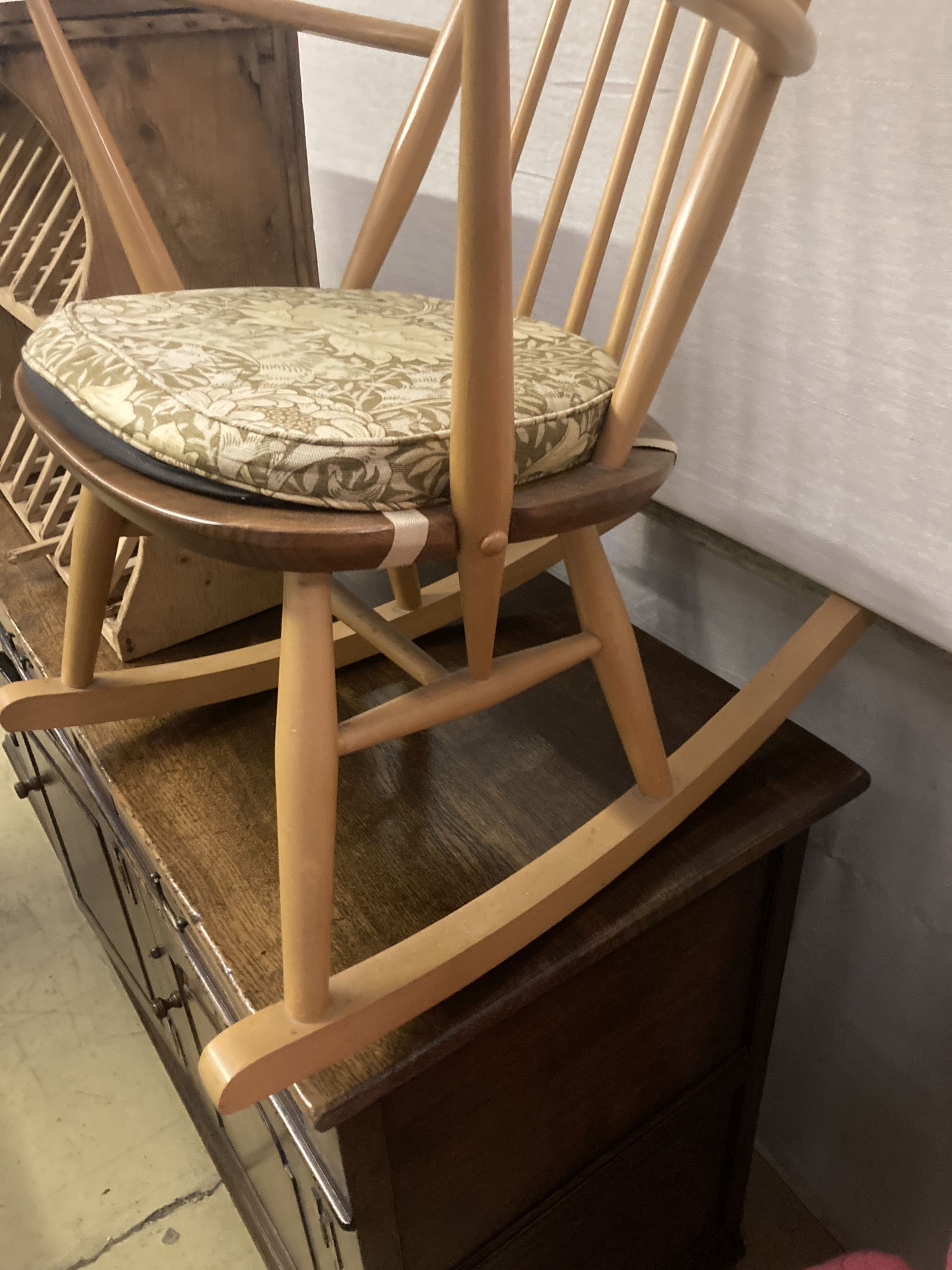 An Ercol stickback beech rocking chair